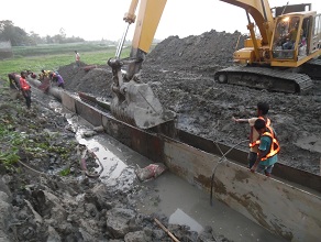 Excavator at Work for Mushurikhola Canal Crossing